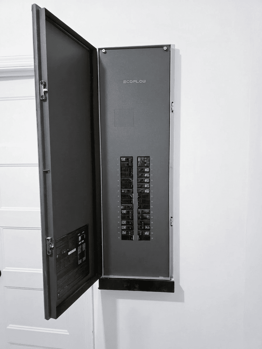 My EcoFlow Smart Home Panel 3, open — the home's main service panel running all 32 circuits